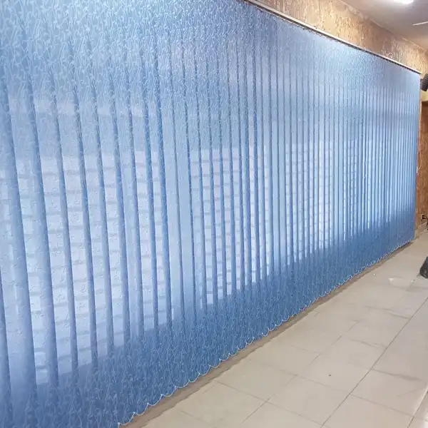 Custom fit vertical blinds with 3.5 inch polyester slats and imported ball chain sets in a Dhaka office